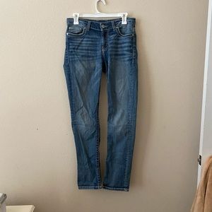 women’s buckle jeans